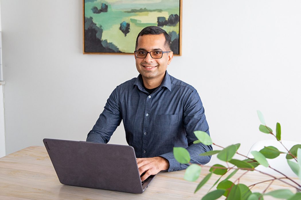 Man sitting at laptop